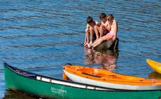 Sharing a rock on Windermere - Tom Nelson